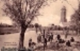 Panorama - od lewej: klasztor, zabudowania domeny „Zamek”, gorzelnia z kominem, wieża zamkowa i budynek gospodarczy. Na pierwszym planie grupa dzieci, przed 1914 r.