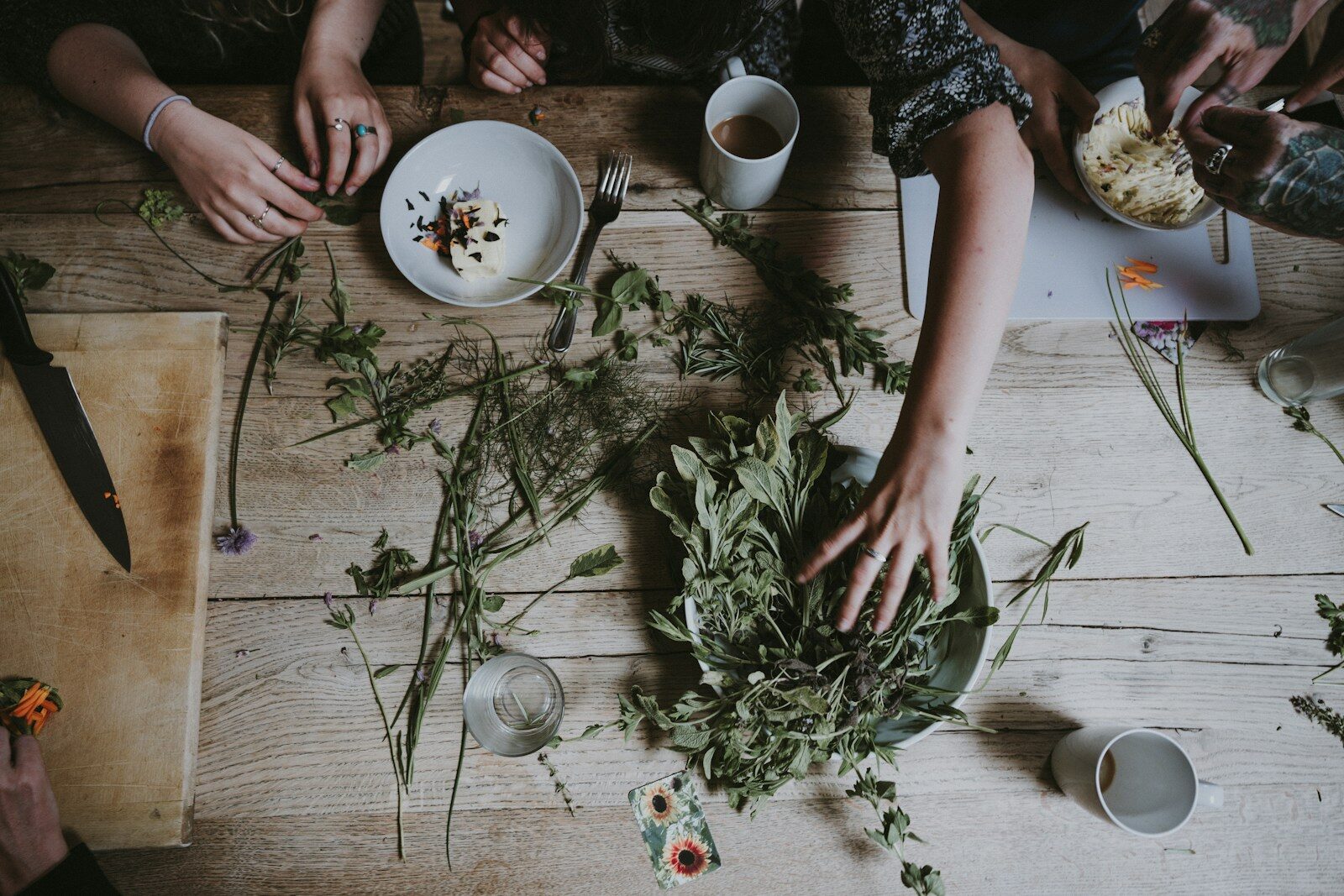 Photo by Annie Spratt person's left arm on green leaves